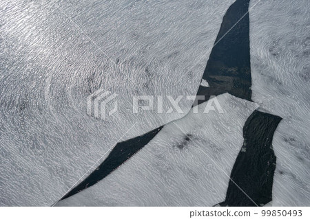 Hokkaido Drift ice on the Abashiri River seen from a boat 99850493