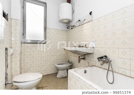 Dirty old bathroom Dirty old bathroom 99851374