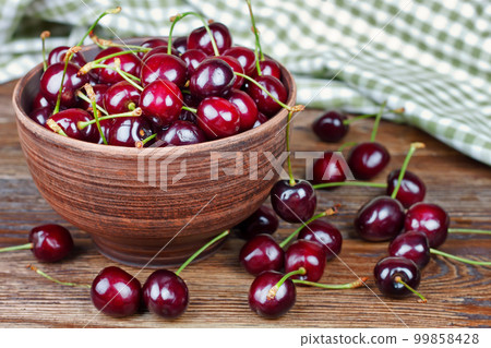 Red sweet cherries in the bowl Red sweet cherries in the bowl 99858428