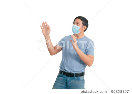 Asian man wearing a mass gesture 99858507