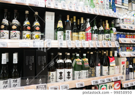 Shopping with my wife at a nearby shopping center on holidays, drinks department 99858950