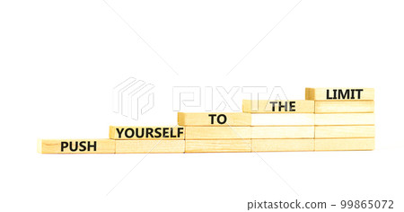 Push the limit symbol. Concept words Push yourself to the limit on wooden blocks. Beautiful white table white background. Business push the limit concept. Copy space. Push the limit symbol. Concept words Push yourself to the limit on wooden blocks. Beautiful white table white background. Business push the limit concept. Copy space. 99865072