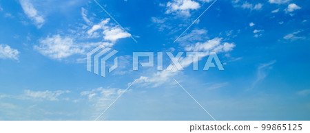 Blue sky with cirrus clouds. Wide photo. Blue sky with cirrus clouds. Wide photo. 99865125
