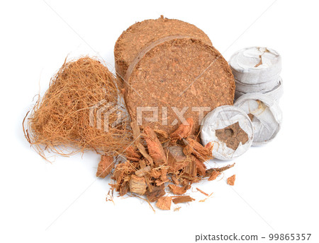 Coconut Coir substrate. Pressed briquette with tabletes and fiber. Isolated on White Background 99865357