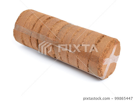 Coconut Coir substrate. Pressed briquette Isolated on White Background Coconut Coir substrate. Pressed briquette Isolated on White Background 99865447