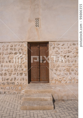Old gate in the old district of Sharjah city. 99866355