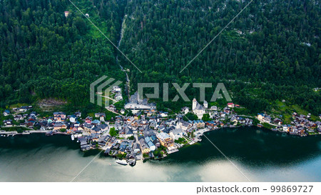 Aerial view of famous Hallstatt mountain village in the Austrian Alps at beautiful light in summer Aerial view of famous Hallstatt mountain village in the Austrian Alps at beautiful light in summer 99869727