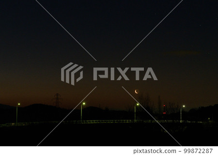 An inverted crescent moon with age of 27.3 in the dawning sky above Maizuru Bridge in Takegawa-cho, Hokuto City An inverted crescent moon with age of 27.3 in the dawning sky above Maizuru Bridge in Takegawa-cho, Hokuto City 99872287