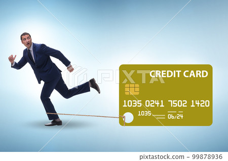 Businessman in the credit card debt concept 99878936