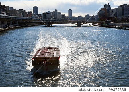 Cargo ship going up Cargo ship going up 99879886