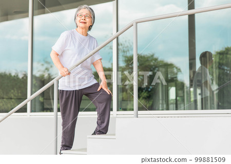 Elderly women going up and down stairs in rehabilitation (locomo, frailty, sarcopenia, osteoporosis) Elderly women going up and down stairs in rehabilitation (locomo, frailty, sarcopenia, osteoporosis) 99881509