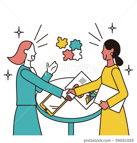 A female business person and an Indian woman who shake hands to conclude a business deal 99882888