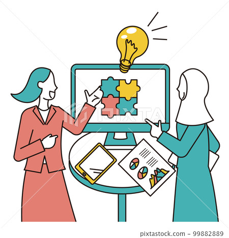A female business person and an Arab woman having business talks in front of a monitor 99882889