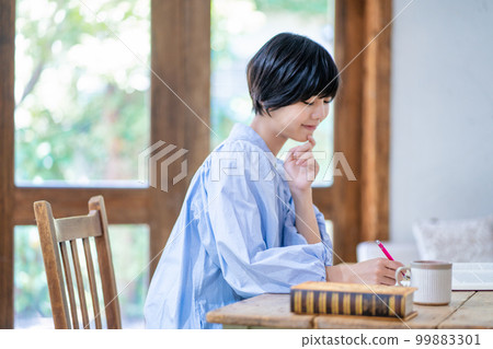 A young woman studying 99883301
