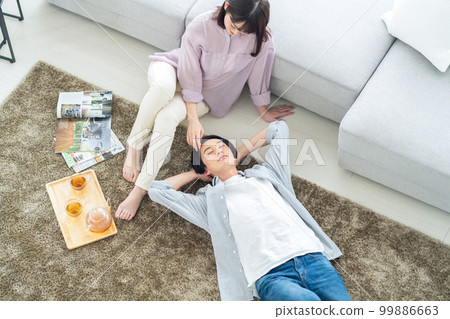 Married couple, family, lifestyle, living room 99886663