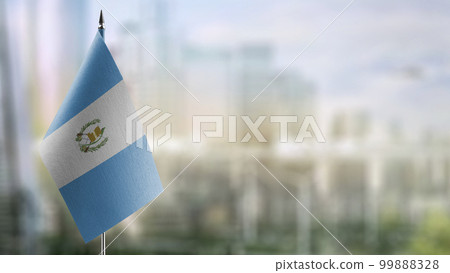 Small flags of the Guatemala on an abstract blurry background 99888328