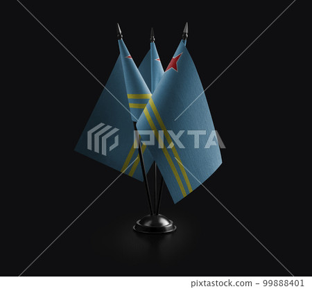 Small national flags of the Aruba on a black background 99888401