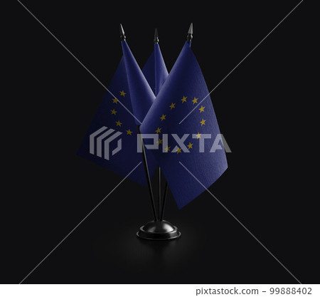 Small national flags of the European Union on a black background 99888402