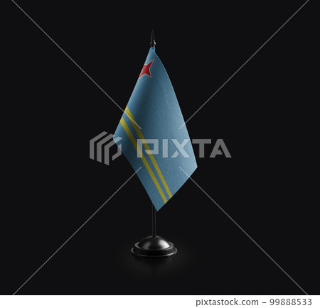 Small national flag of the Aruba on a black background 99888533