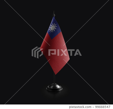 Small national flag of the Taiwan on a black background 99888547