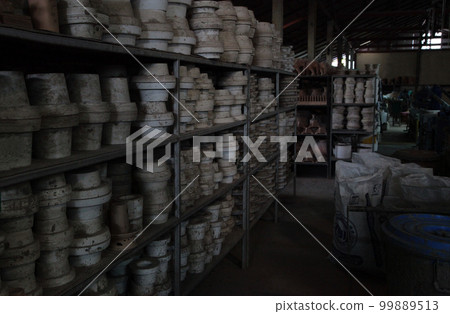 Mothers of sacred Buddhist altar fittings of Thai Theravada Buddhism sleeping in the plaster mold storage of Chiang Mai Ceramics Studio, Thailand Mothers of sacred Buddhist altar fittings of Thai Theravada Buddhism sleeping in the plaster mold storage of Chiang Mai Ceramics Studio, Thailand 99889513