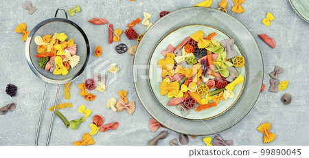 Assorted uncooked pasta colorful 99890045