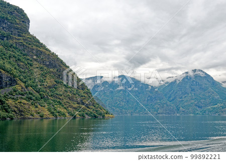Beautiful view of Flam Fjord from a cruise boat trip Beautiful view of Flam Fjord from a cruise boat trip 99892221