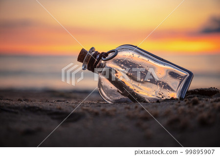 Message in the bottle against the Sun setting down Message in the bottle against the Sun setting down 99895907