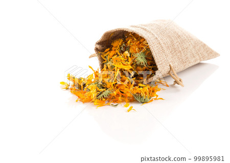 Calendula flowewr tea isolated on white Calendula flowewr tea isolated on white 99895981