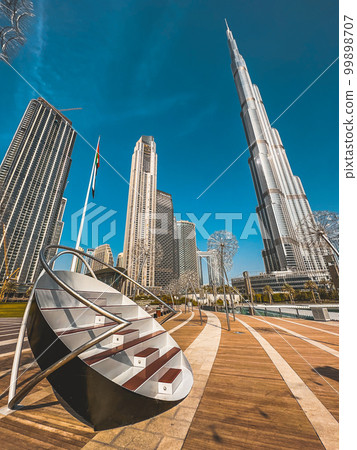 Burj Khalifa view from Burj park bridge in Downtown Dubai, United Arab Emirates 99898707