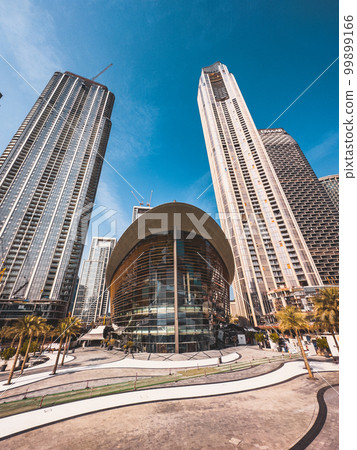 Dubai Opera house in Downtown Dubai, surrounded by skyscrapers and Burj Khalifa, in UAE, United Arab 99899166