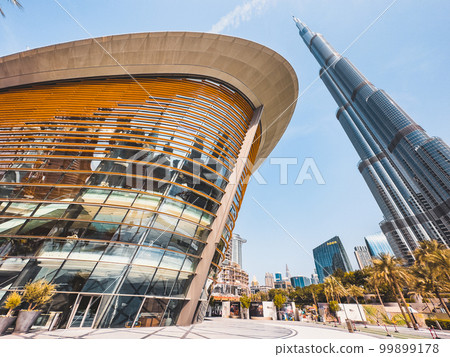 Dubai Opera house in Downtown Dubai, surrounded by skyscrapers and Burj Khalifa, in UAE, United Arab Dubai Opera house in Downtown Dubai, surrounded by skyscrapers and Burj Khalifa, in UAE, United Arab 99899178
