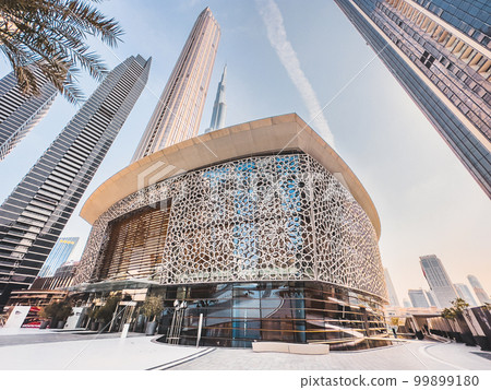 Dubai Opera house in Downtown Dubai, surrounded by skyscrapers and Burj Khalifa, in UAE, United Arab Dubai Opera house in Downtown Dubai, surrounded by skyscrapers and Burj Khalifa, in UAE, United Arab 99899180