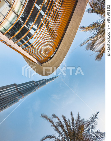 Dubai Opera house in Downtown Dubai, surrounded by skyscrapers and Burj Khalifa, in UAE, United Arab Dubai Opera house in Downtown Dubai, surrounded by skyscrapers and Burj Khalifa, in UAE, United Arab 99899182