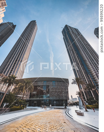 Dubai Opera house in Downtown Dubai, surrounded by skyscrapers and Burj Khalifa, in UAE, United Arab Dubai Opera house in Downtown Dubai, surrounded by skyscrapers and Burj Khalifa, in UAE, United Arab 99899220