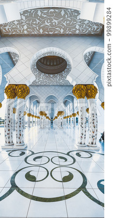 Sheikh Zayed Grand Mosque hallway corridor during sunset, in Abu Dhabi, United Arab Emirates Sheikh Zayed Grand Mosque hallway corridor during sunset, in Abu Dhabi, United Arab Emirates 99899284