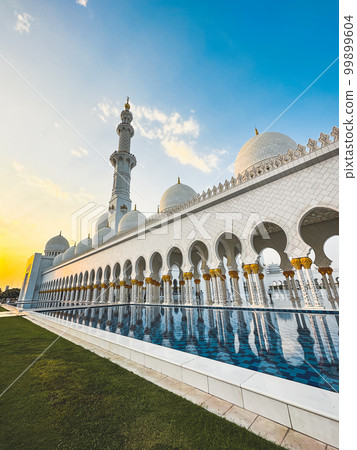 The Sheikh Zayed Grand Mosque during sunset, in Abu Dhabi, United Arab Emirates The Sheikh Zayed Grand Mosque during sunset, in Abu Dhabi, United Arab Emirates 99899604