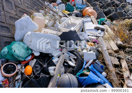 Marine garbage washed ashore on the beautiful Mihama beach 99900161