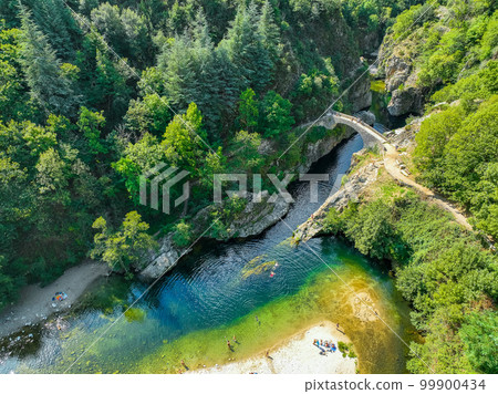 Le pont du diable or Devil Bridge ain Thueyts village in the Ardeche department in southern France. Le pont du diable or Devil Bridge ain Thueyts village in the Ardeche department in southern France. 99900434