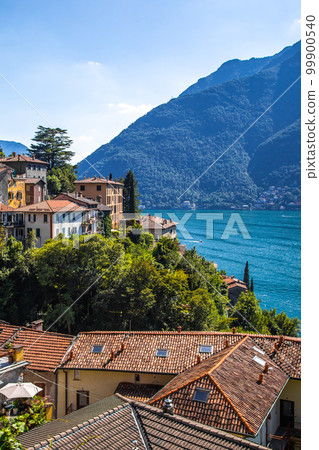 Aerial view of Nesso, a picturesque and colourful village sitting on the banks of Lake Como, Italy Aerial view of Nesso, a picturesque and colourful village sitting on the banks of Lake Como, Italy 99900540