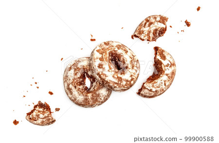 Chopped gingerbread cookies with sugar icing isolated on white background with clipping path top view Chopped gingerbread cookies with sugar icing isolated on white background with clipping path top view 99900588