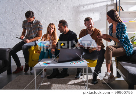People work together in a modern office as teamwork and partner 99900796