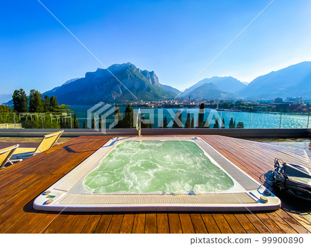 Jacuzzi view of Lecco city in Lake Como in Italy 99900890