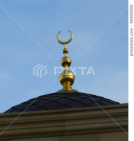 Dome of mosque with a signs of crescent and star. The Ar-Rahma Mosque Dome of mosque with a signs of crescent and star. The Ar-Rahma Mosque 99900898