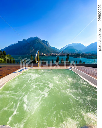 Jacuzzi view of Lecco city in Lake Como in Italy 99900901