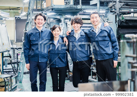 Factory staff working hand-in-hand 99902381