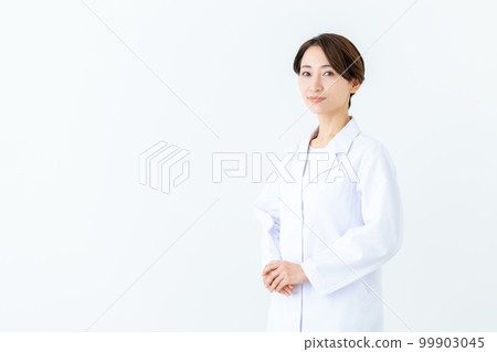 middle-aged woman in white coat 99903045