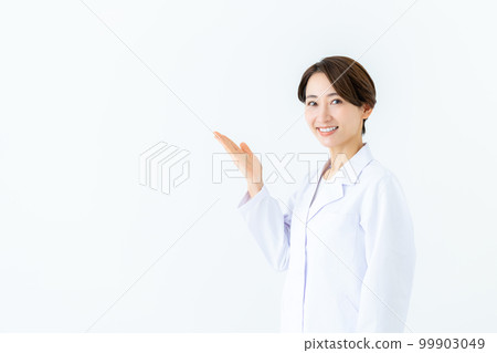 middle-aged woman in white coat middle-aged woman in white coat 99903049