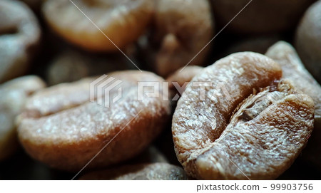 Macro shot coffee beans for background Macro shot coffee beans for background 99903756