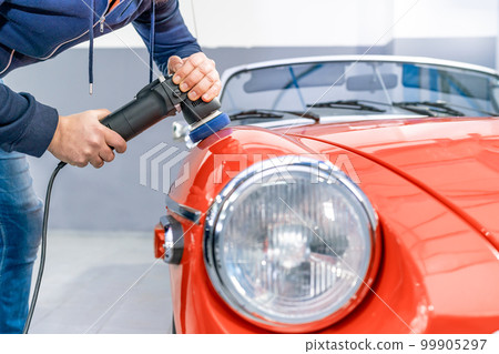 detailing of car body, polishing with using a mechanical sander, care about the car, automotive detailing of car body, polishing with using a mechanical sander, care about the car, automotive 99905297